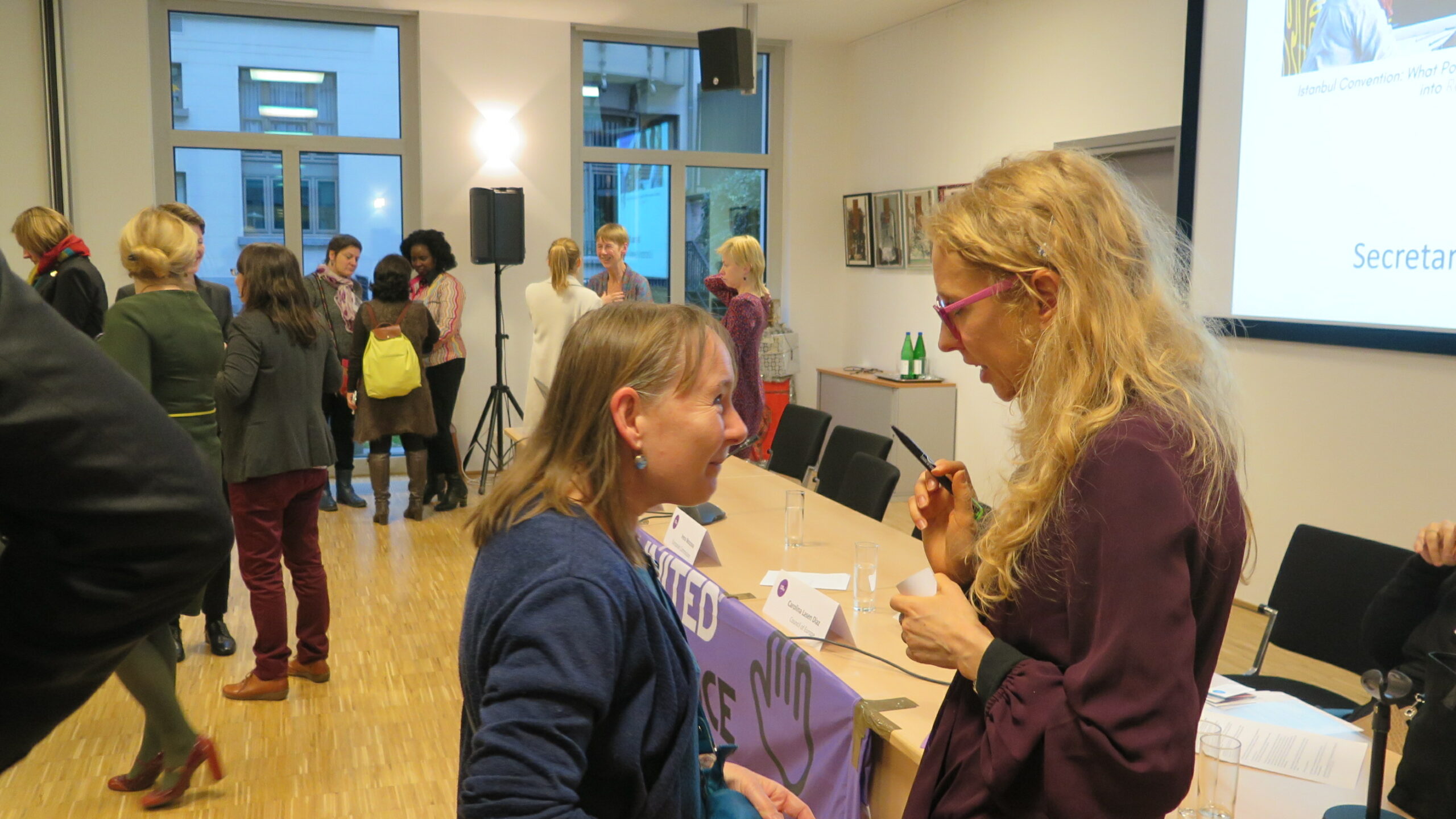 Professor Sara de Vido speaking with Participant at #LoudUnited Conference