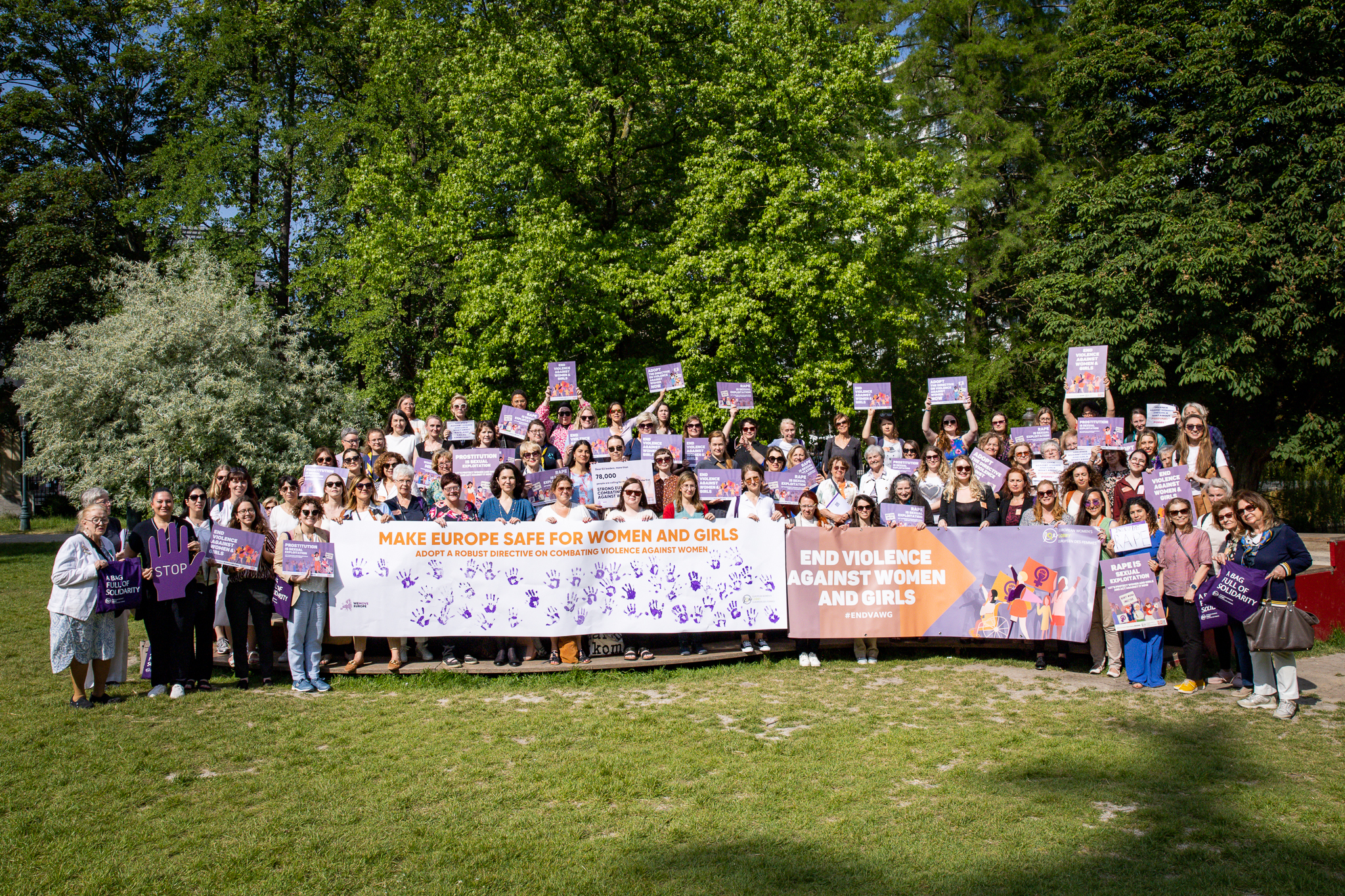 Group of women holding posters